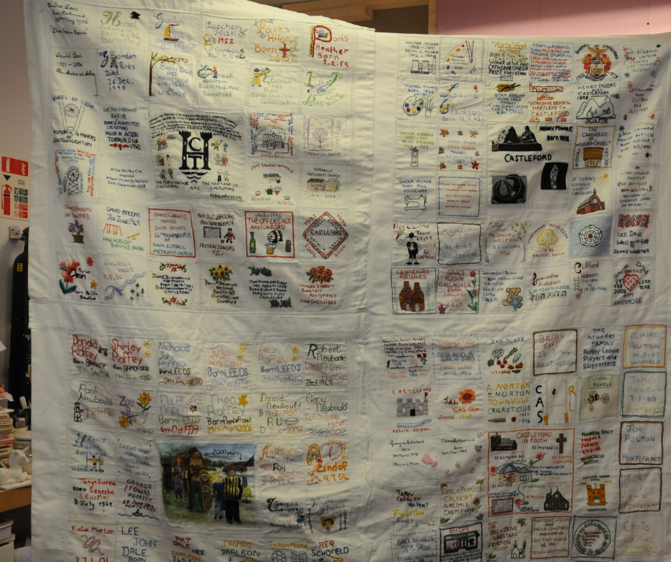 The Heritage Quilt one of the many projects of the Quilting and Sewing Group at Queen's Mill. Lots of small images, words and phrases depicting people and landscapes from Castleford are joined together on the Quilt.